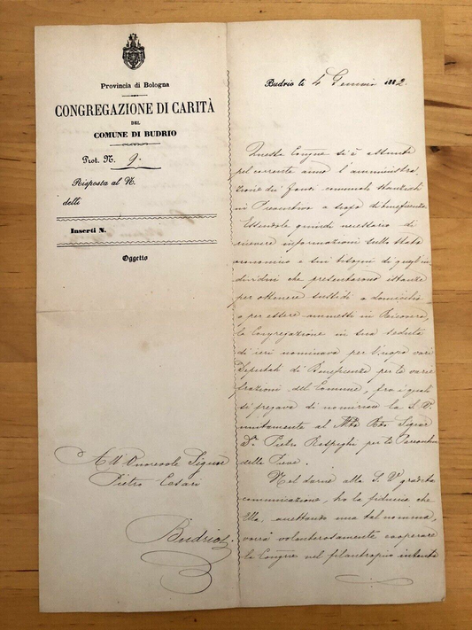 BUDRIO documento antico 1882 congregazione di carità. Bologna