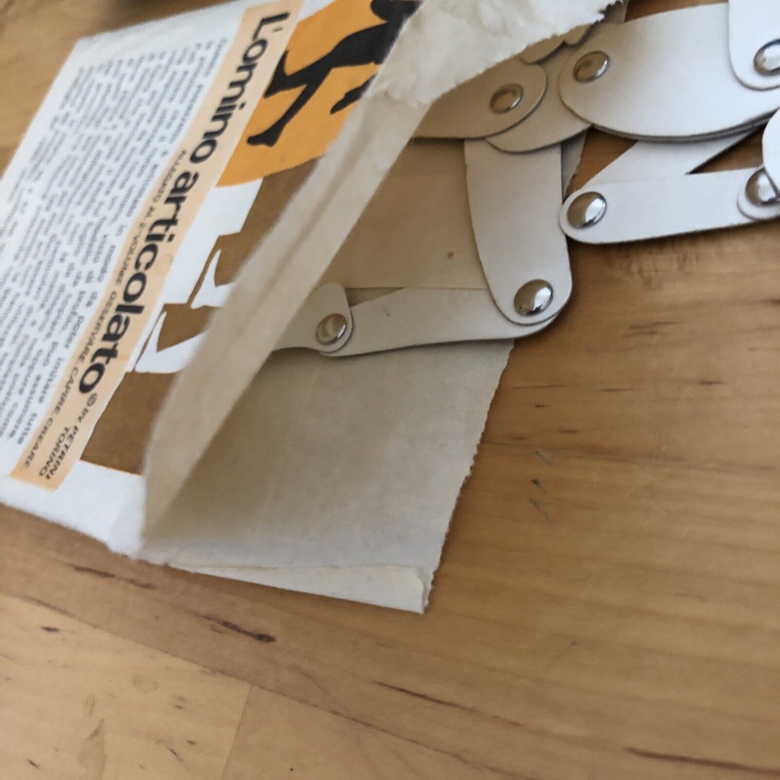 L'omino articolato - Petrini Antonio, con busta contenitore di carta